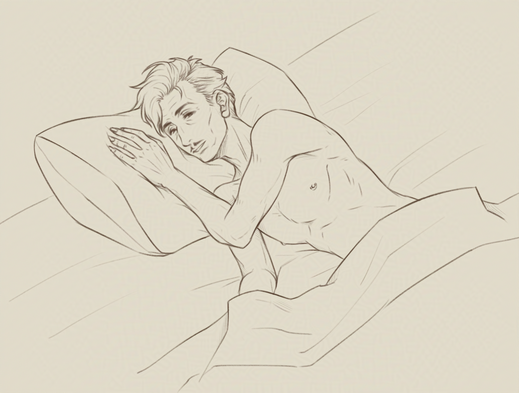 Emmrich looks up from his pillow, sleepy but smiling. His hair is tousled and his arm is draped over his bare chest with his hand close to his face.